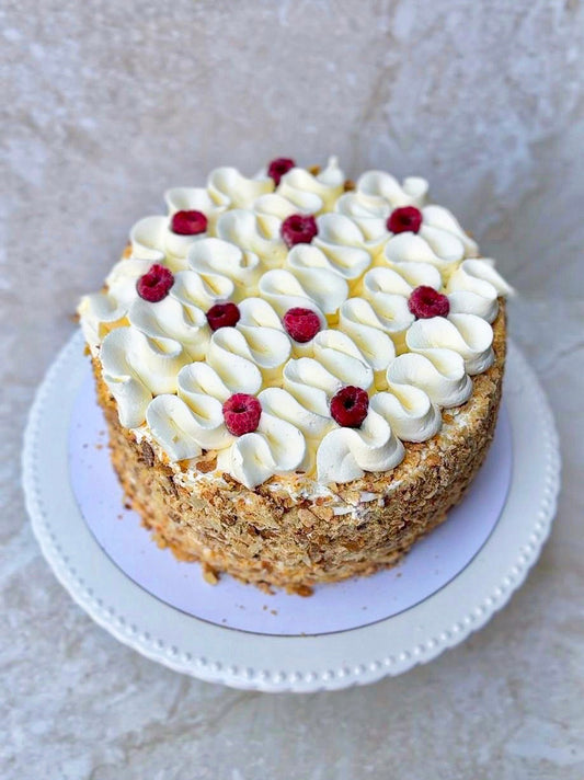 TORTA MANJAR, CREMA Y FRAMBUESA